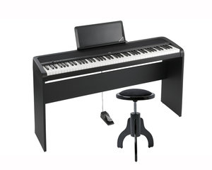 Piano Korg B1 in Aktion gesetzt mit Ständer Korg STB1 ein runder Hocker Gewa 900550